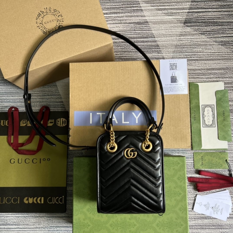 G*u*i top handle bags